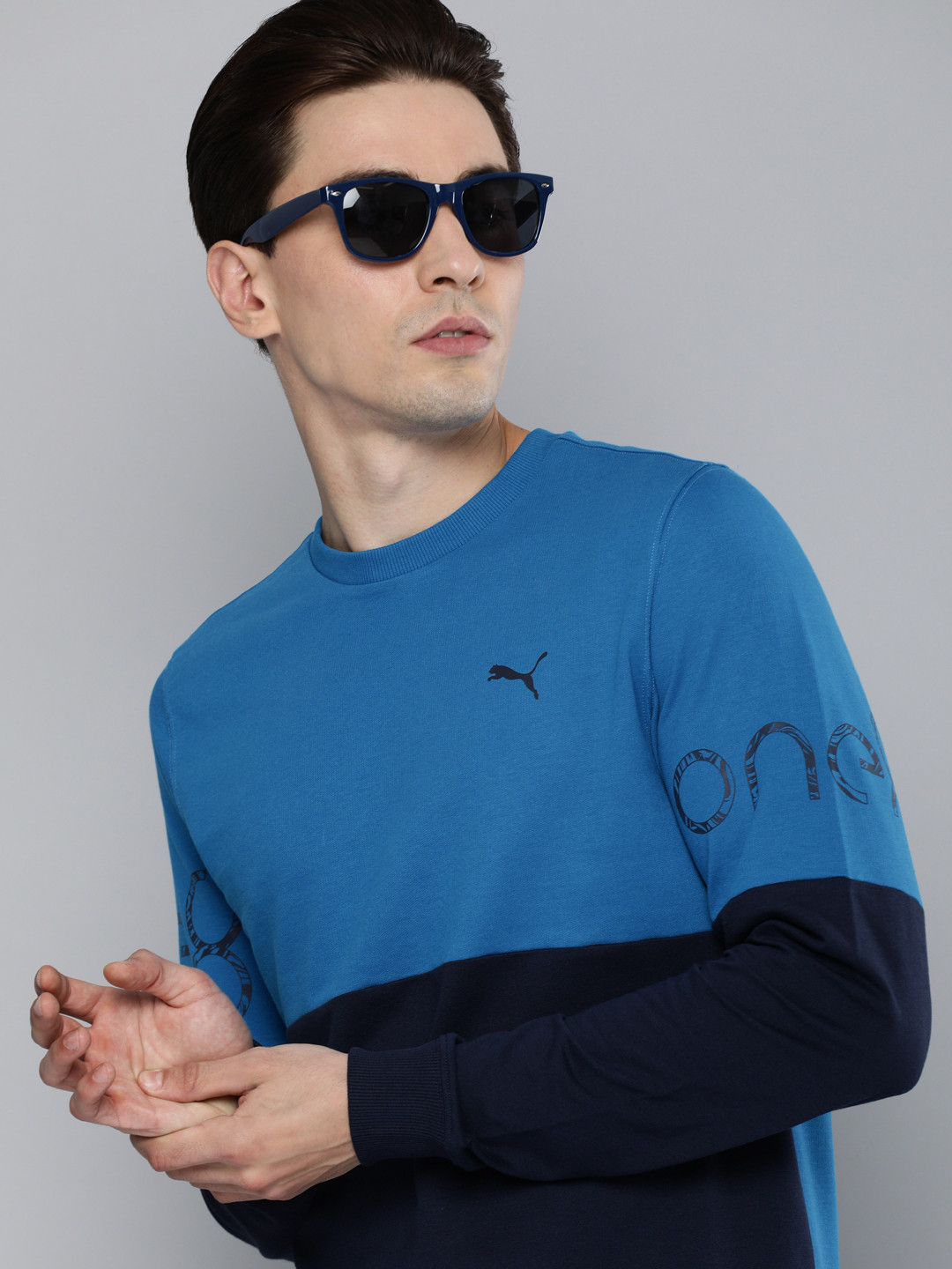 

one8 x PUMA Men Blue & Navy Blue Colourblocked Sweatshirt