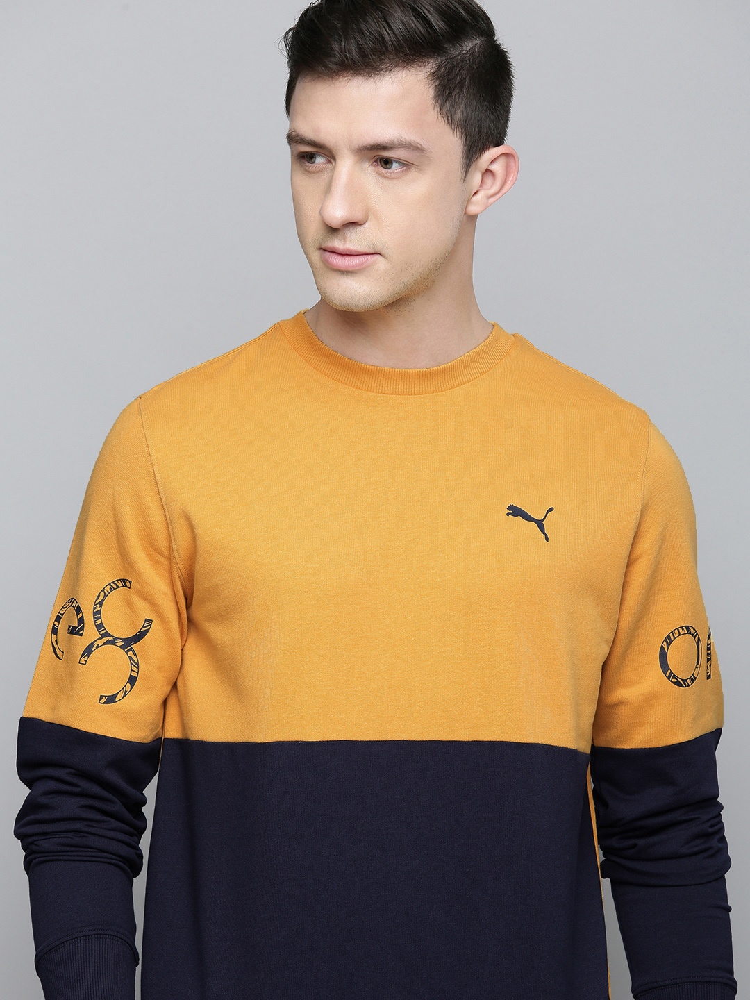 

one8 x PUMA Men Mustard And Navy-Blue Colourblocked Pullover Sweatshirt