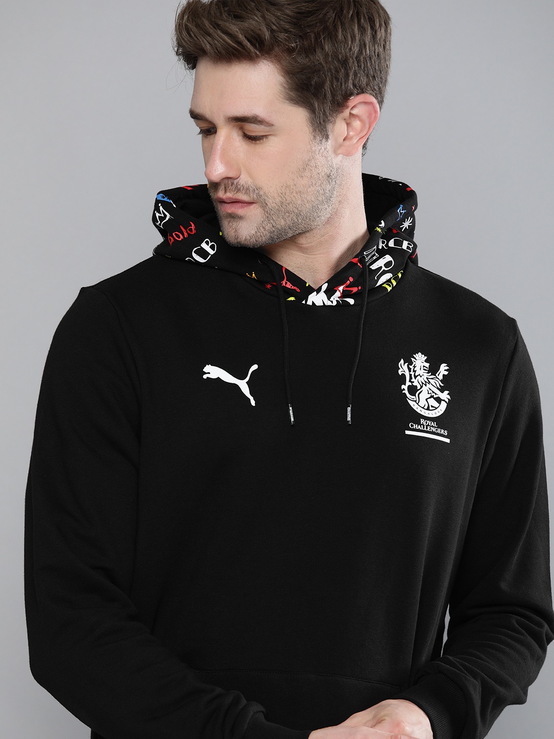 

Puma Men Black & White Graphic Printed RCB Hooded Sweatshirt