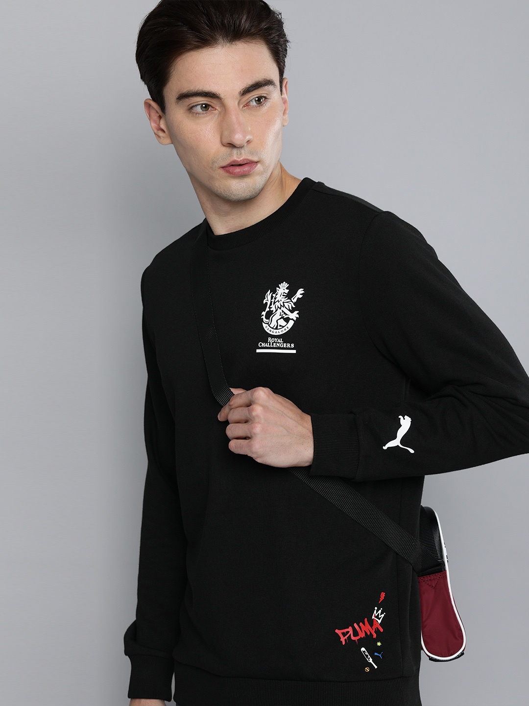 

Puma Men Black Puma x RCB Graphic Sweatshirt
