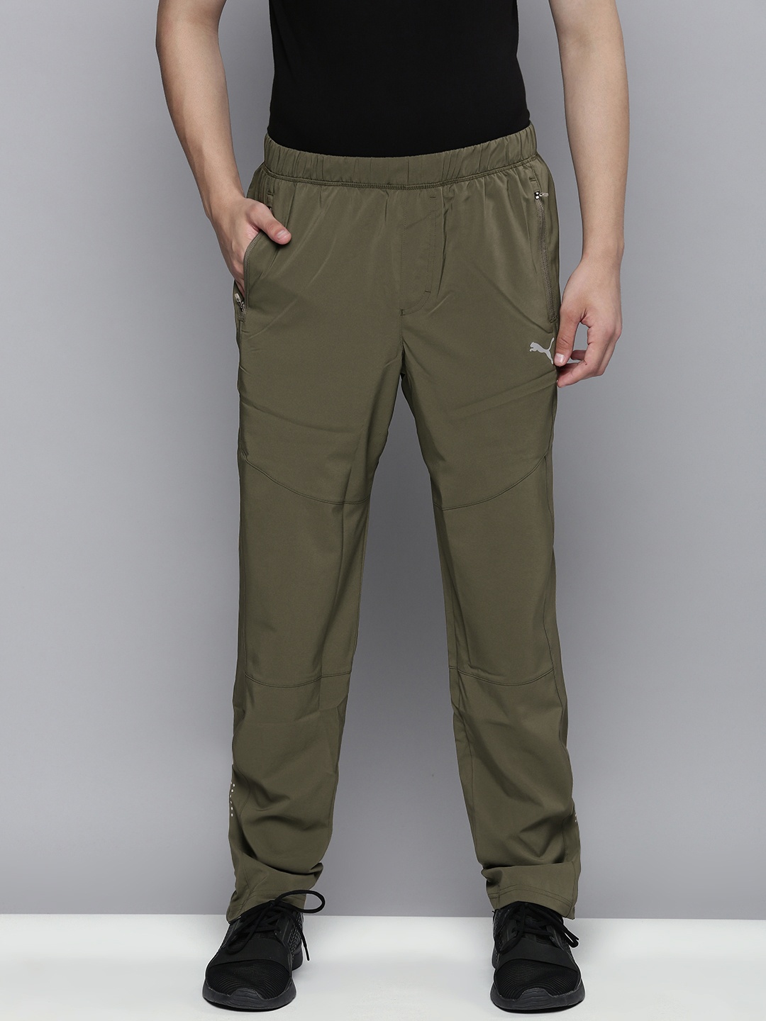 

Puma Men Olive Green Solid Tapered Woven Track Pants