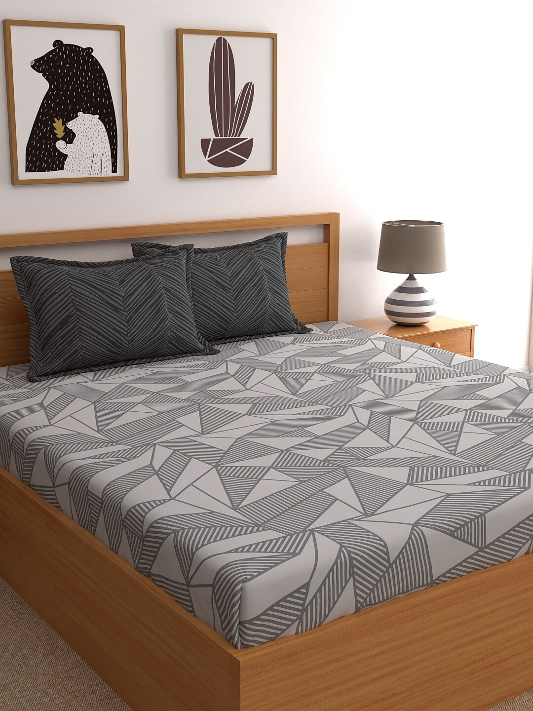 

Home Ecstasy Grey & Black Geometric 140 TC King Bedsheet with 2 Pillow Covers