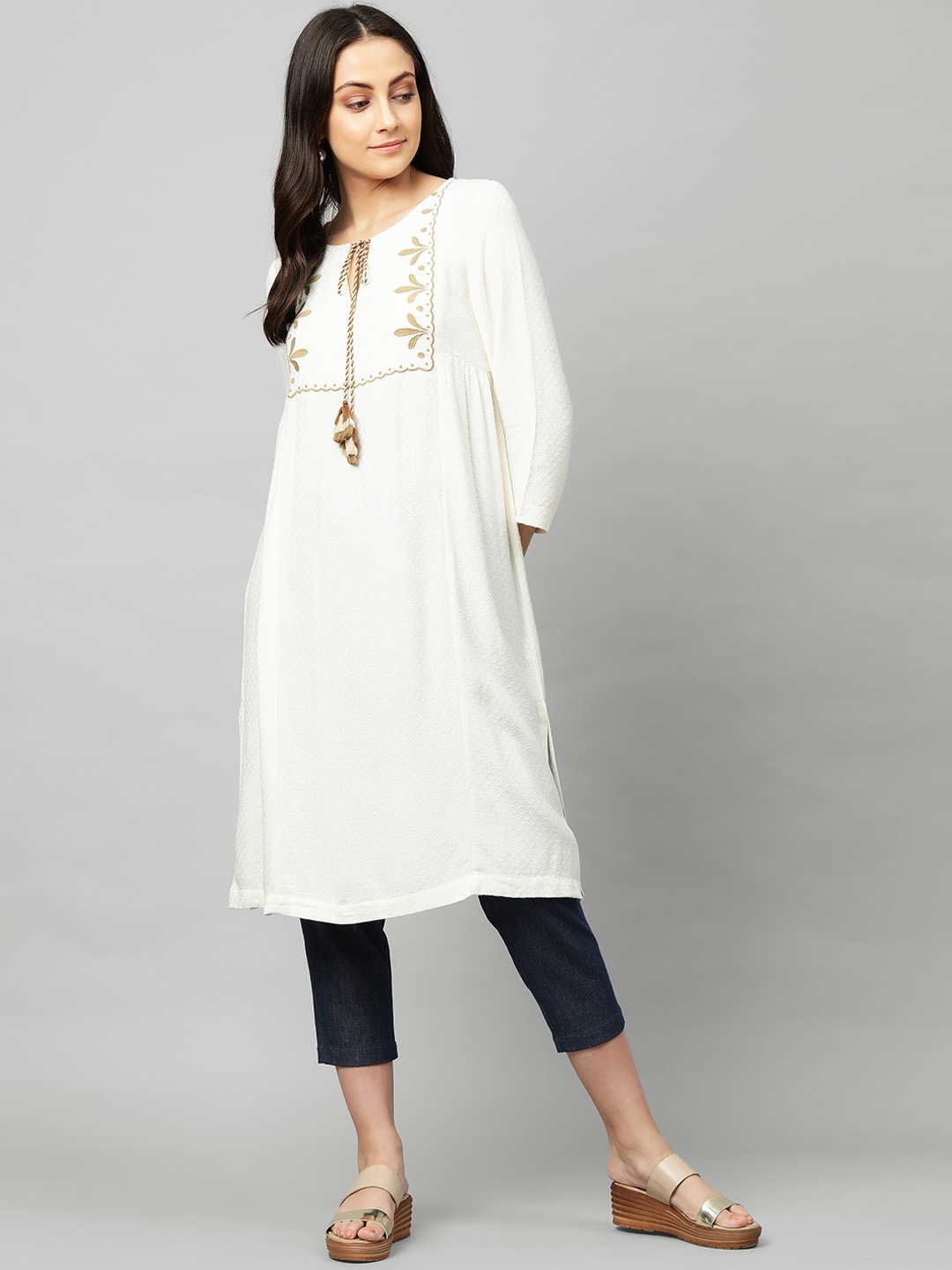 

Modern Indian by CHEMISTRY Women Cream Embroidered Viscose Dobby Kurta & Denim Trouser Set
