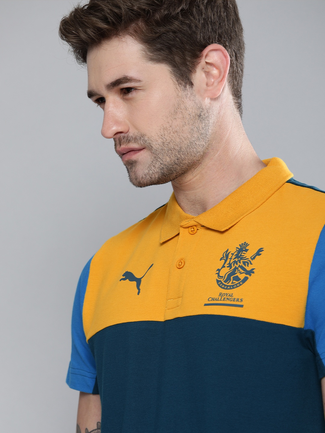 

Puma Men Navy Blue & Yellow Colourblocked RCB Polo Collar T-shirt