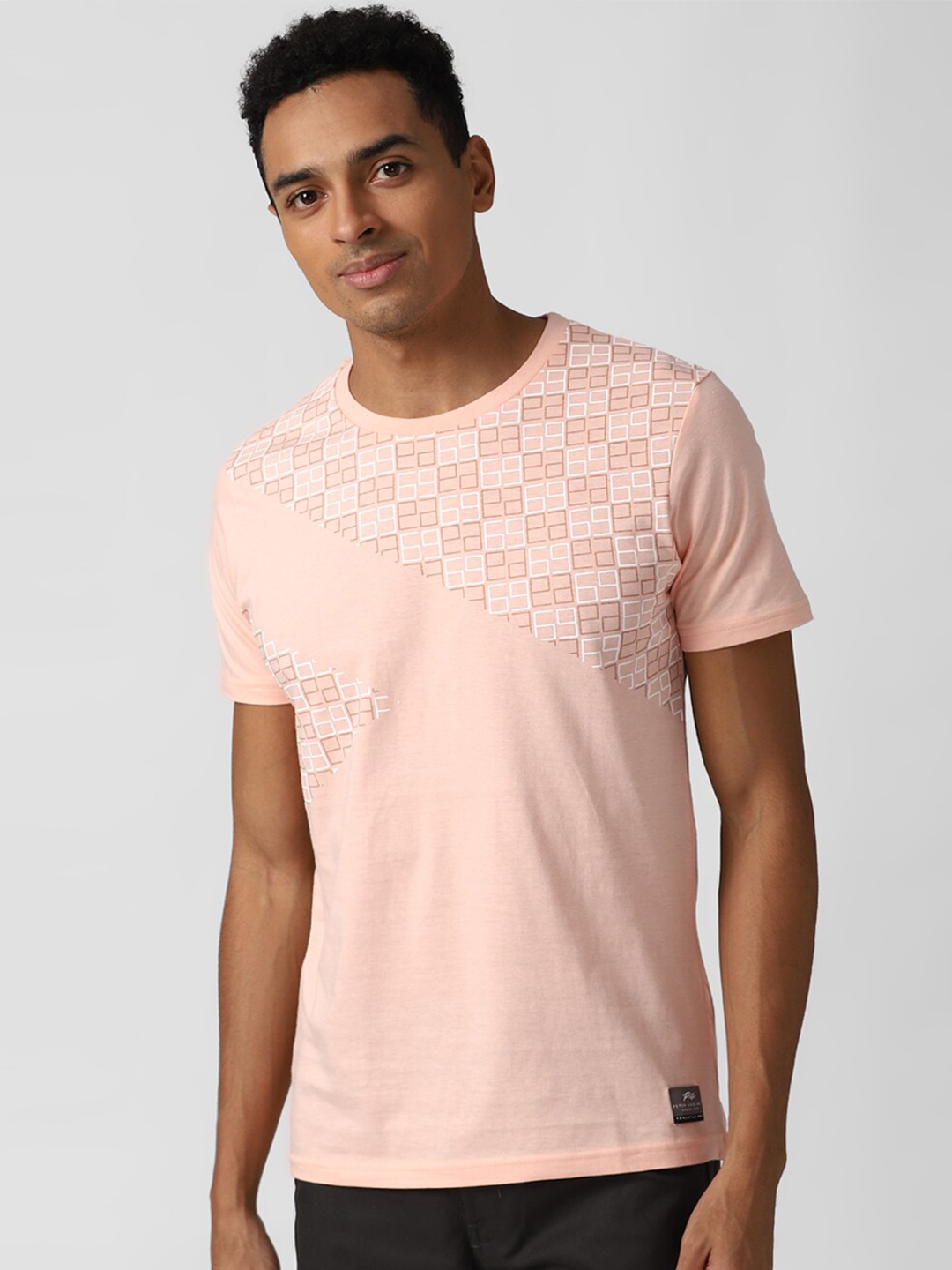 

Peter England Casuals Men Peach-Coloured White Printed Slim Fit Cotton Pure Cotton T-shirt