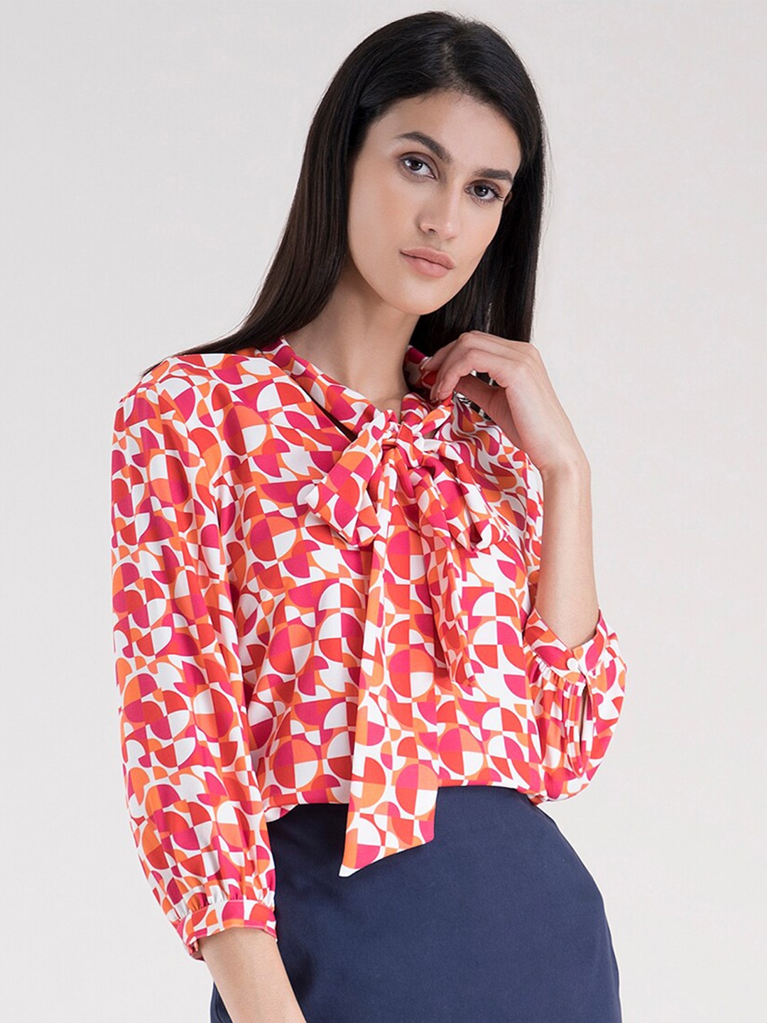 

FableStreet Orange & Red Geometric Print Tie-Up Neck Regular Top