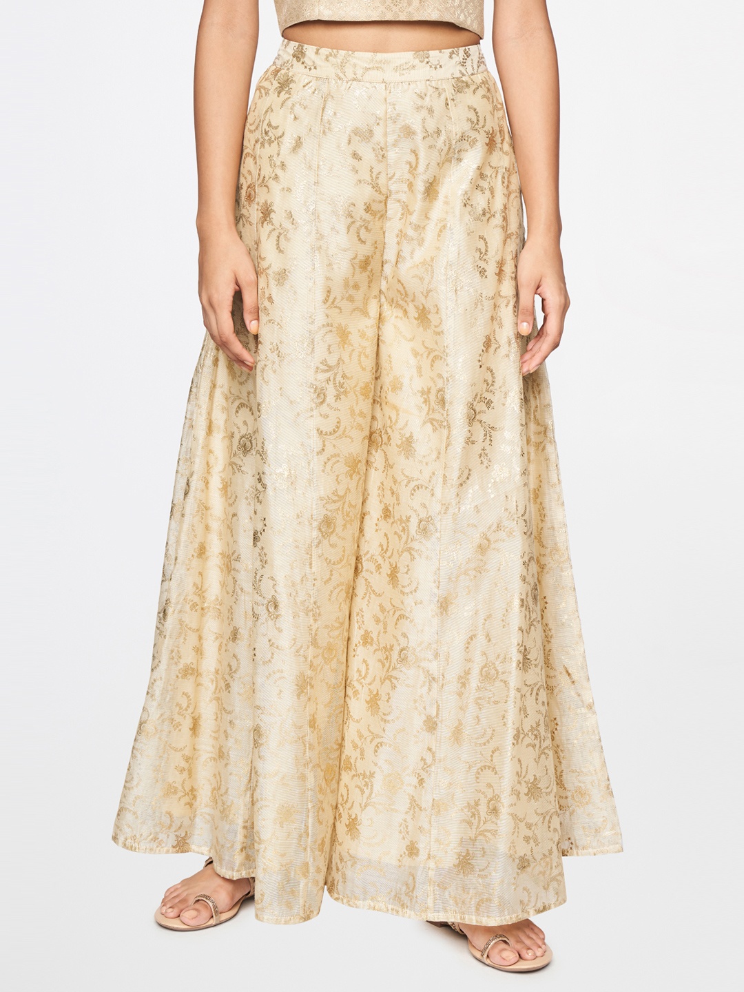 

Global Desi Women Beige & Gold-Toned Flared Palazzos