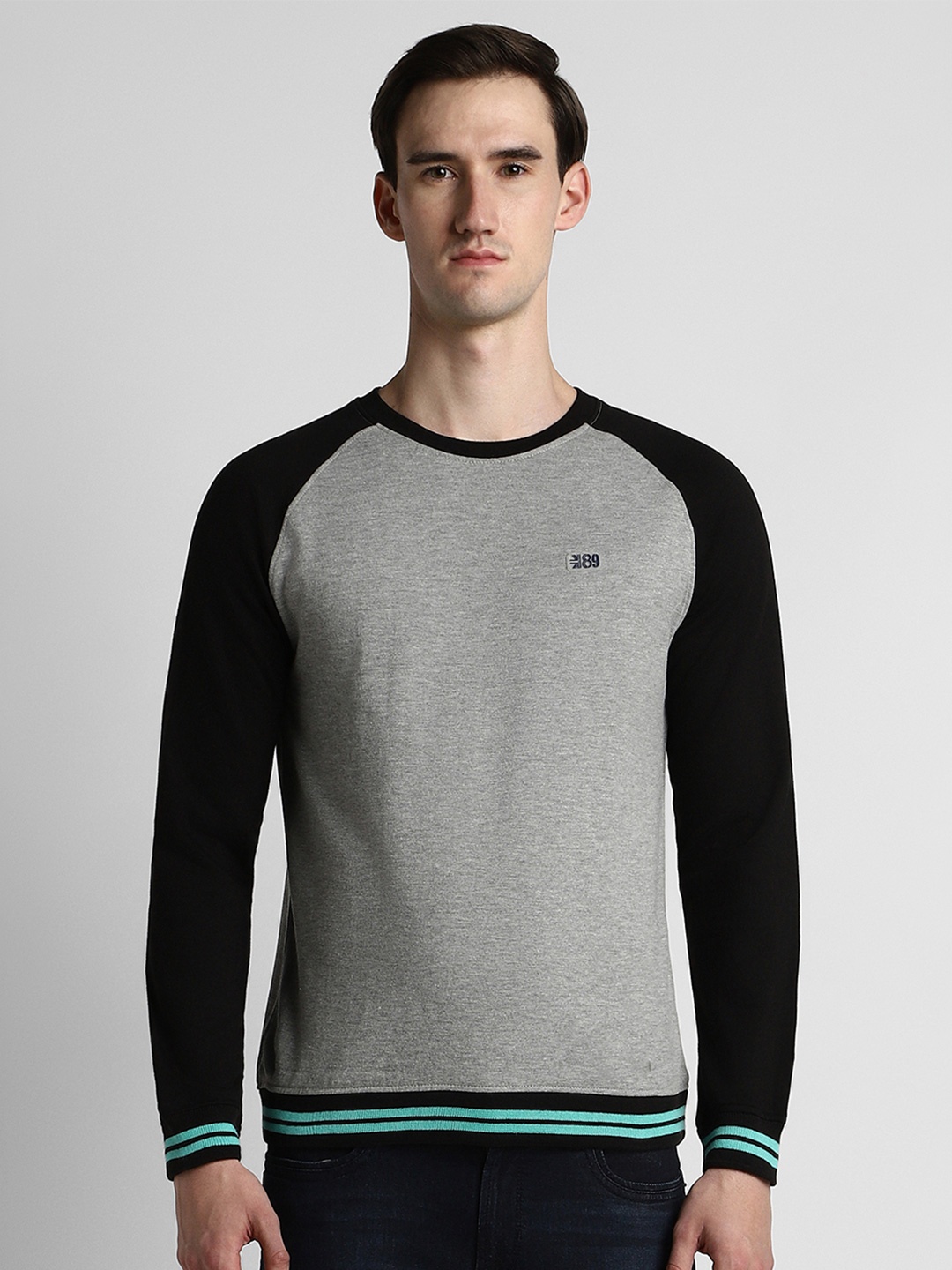 

Peter England Casuals Men Grey & Black Colourblocked Sweatshirt