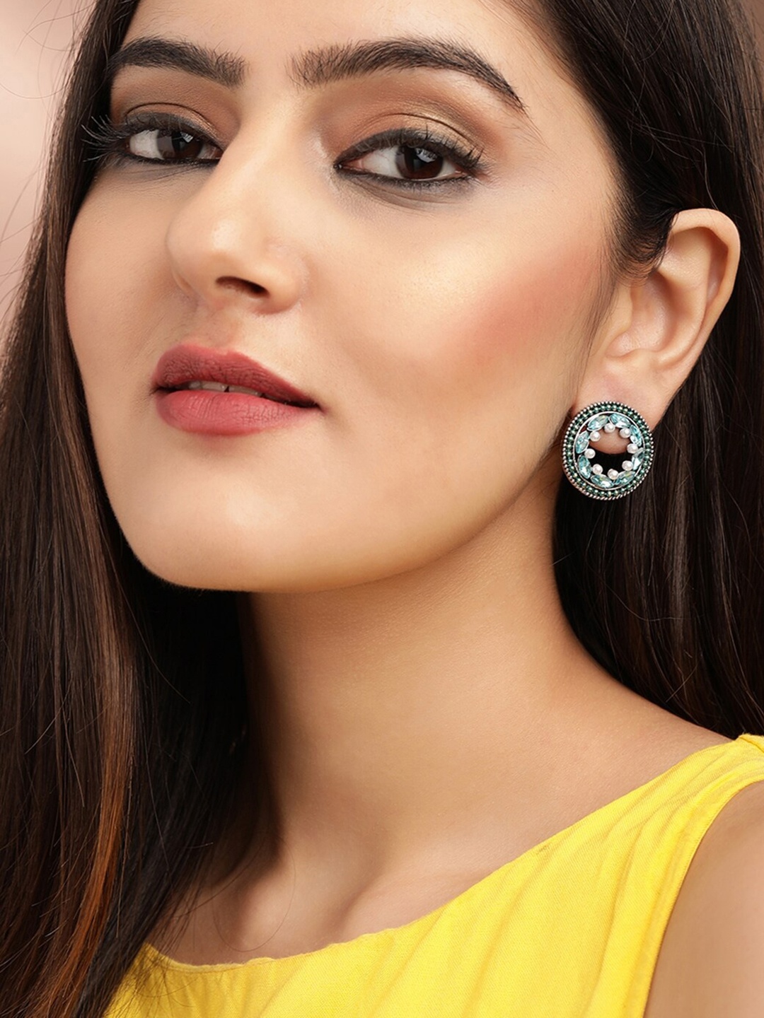 

Rubans Silver-Toned and Plated Contemporary Studs Earrings