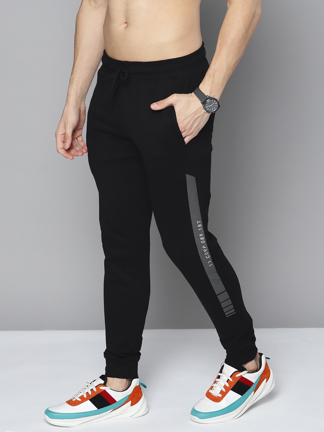 

HERE&NOW Men Black Solid Cotton Joggers with Side Taping Detail
