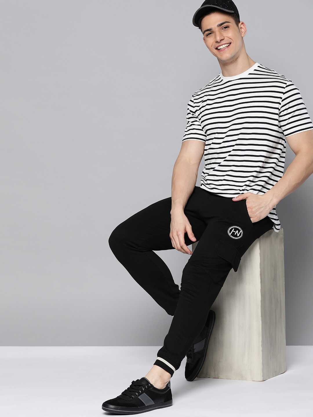 

HERE&NOW Men Black Pure Cotton Brand Logo Printed Joggers