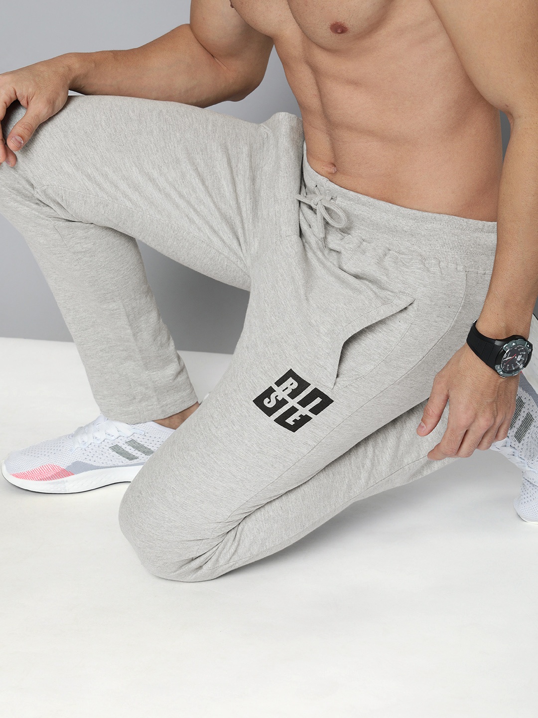 

HERE&NOW Men Black Solid Pure Cotton Trackpant, Grey