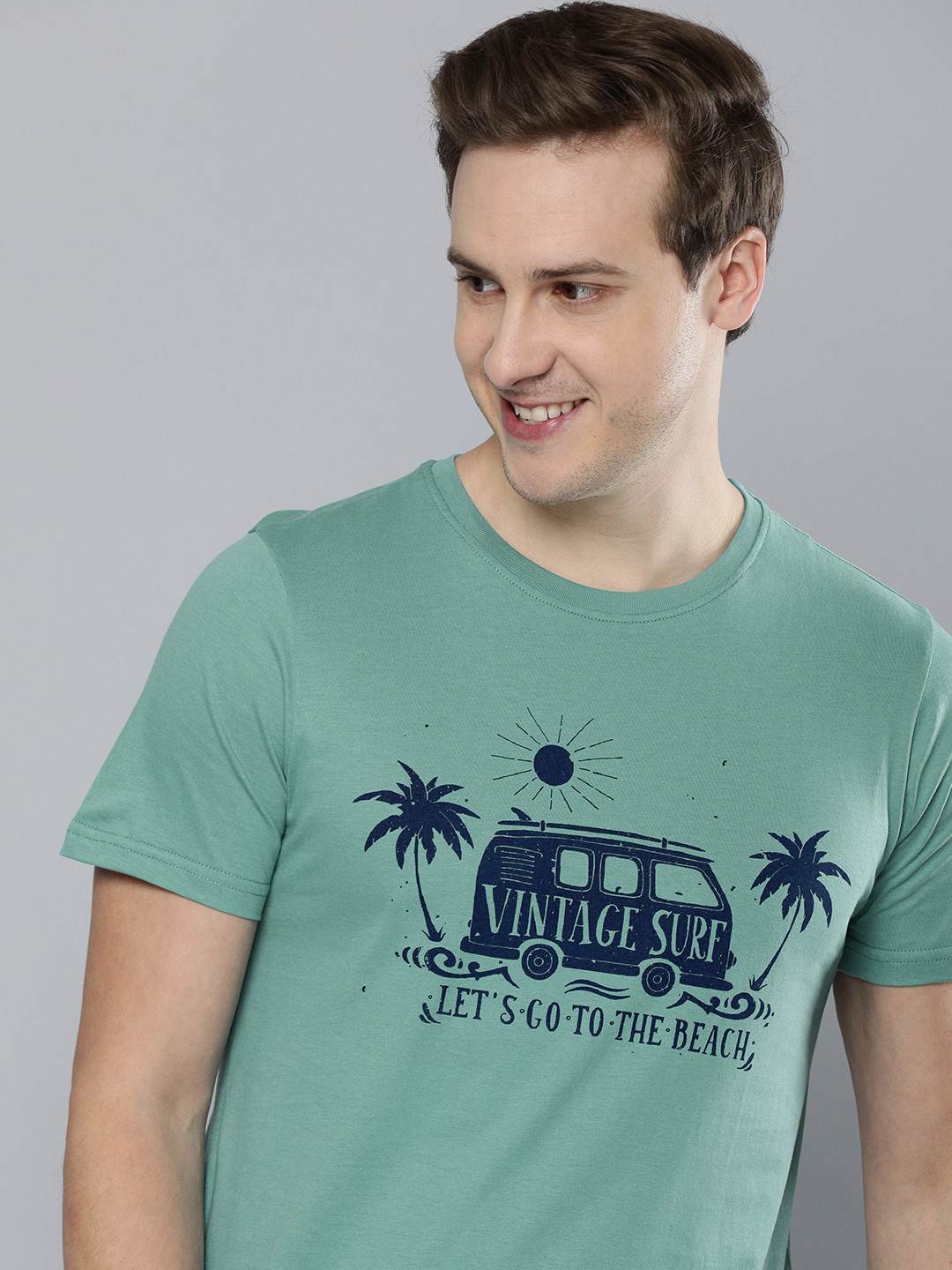 

Mast & Harbour Men Blue Graphic Printed Pure Cotton Casual T-shirt