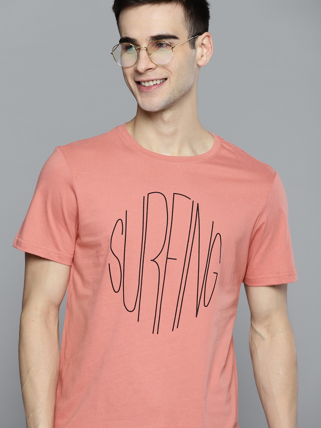 

Mast & Harbour Men Pink & Black Pure Cotton Typography Printed Tropical T-shirt