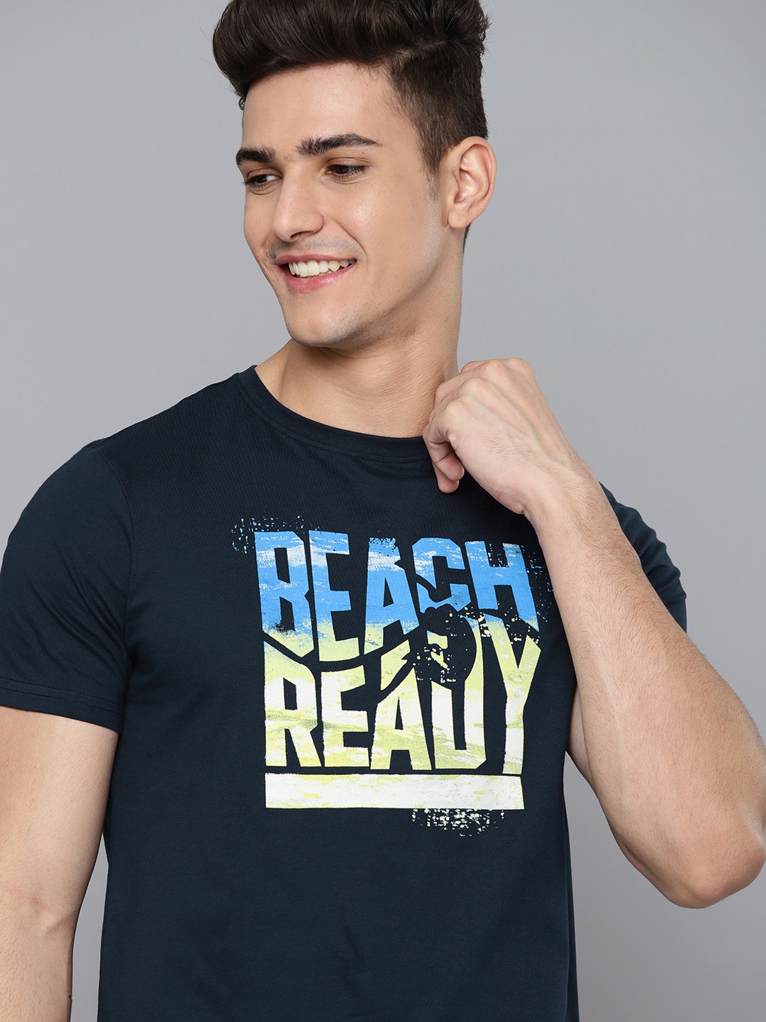 

Mast & Harbour Men Navy Blue & Yellow Cotton Typography Printed T-shirt