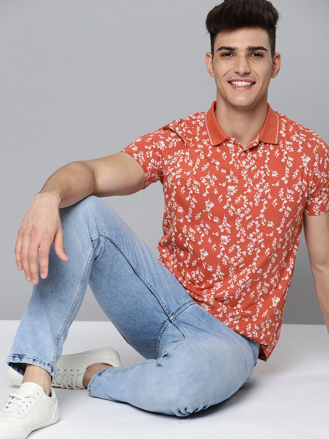 

Mast & Harbour Men Orange & White Pure Cotton Floral Printed Polo Collar T-shirt