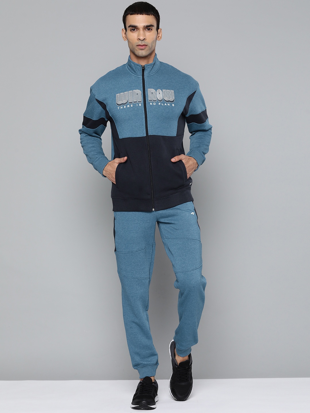 

Alcis Men Blue Colourblocked Track Suits