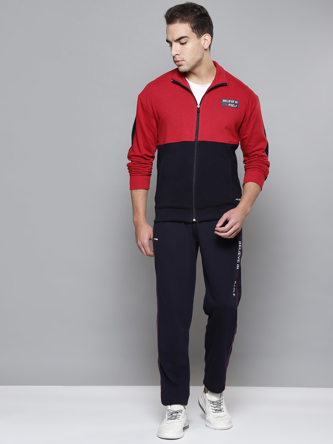 

Alcis Men Red & Navy Blue Colourblocked Tracksuit