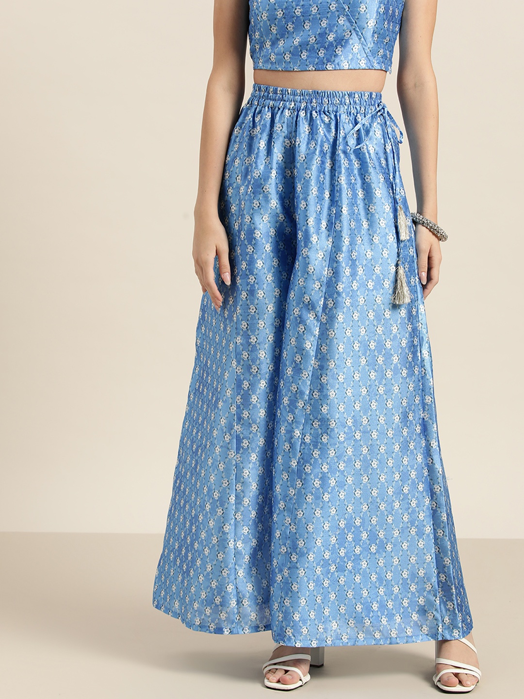 

Shae by SASSAFRAS Women Blue Floral Printed Flared Palazzos