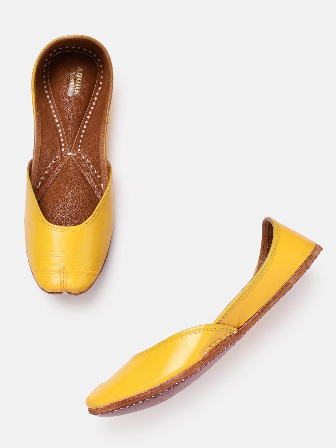 

Anouk Women Mustard Yellow Solid Handmade Leather Mojaris