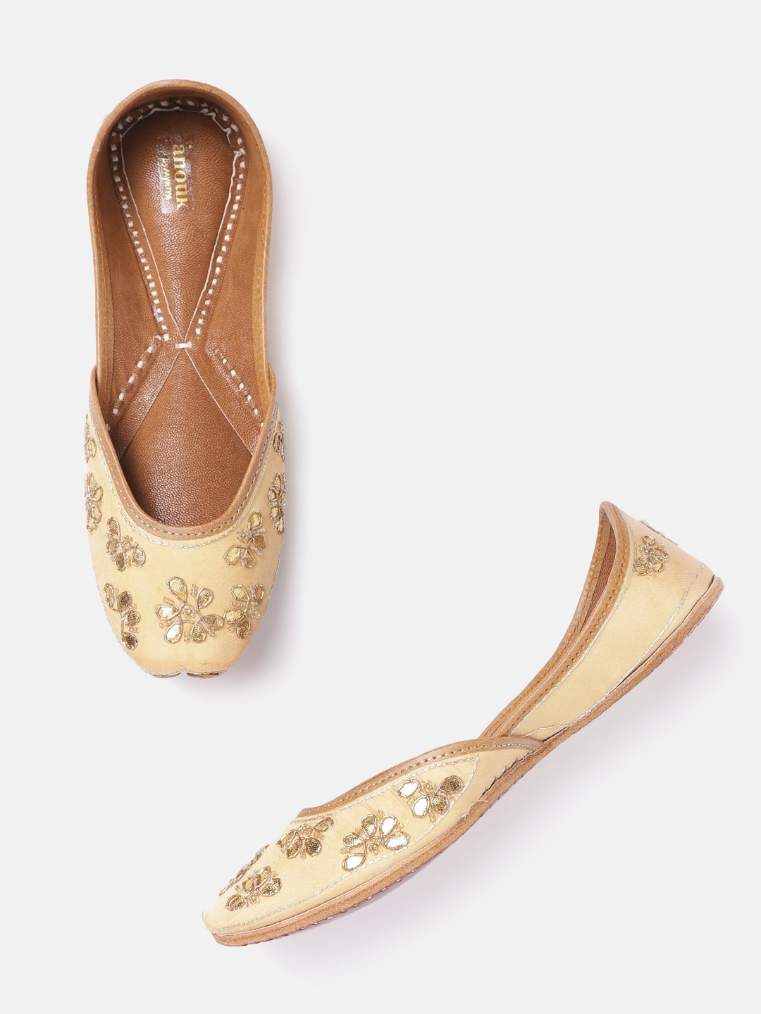 

Anouk Women Beige & Gold-Toned Ethnic Embellished Handcrafted Leather Mojaris