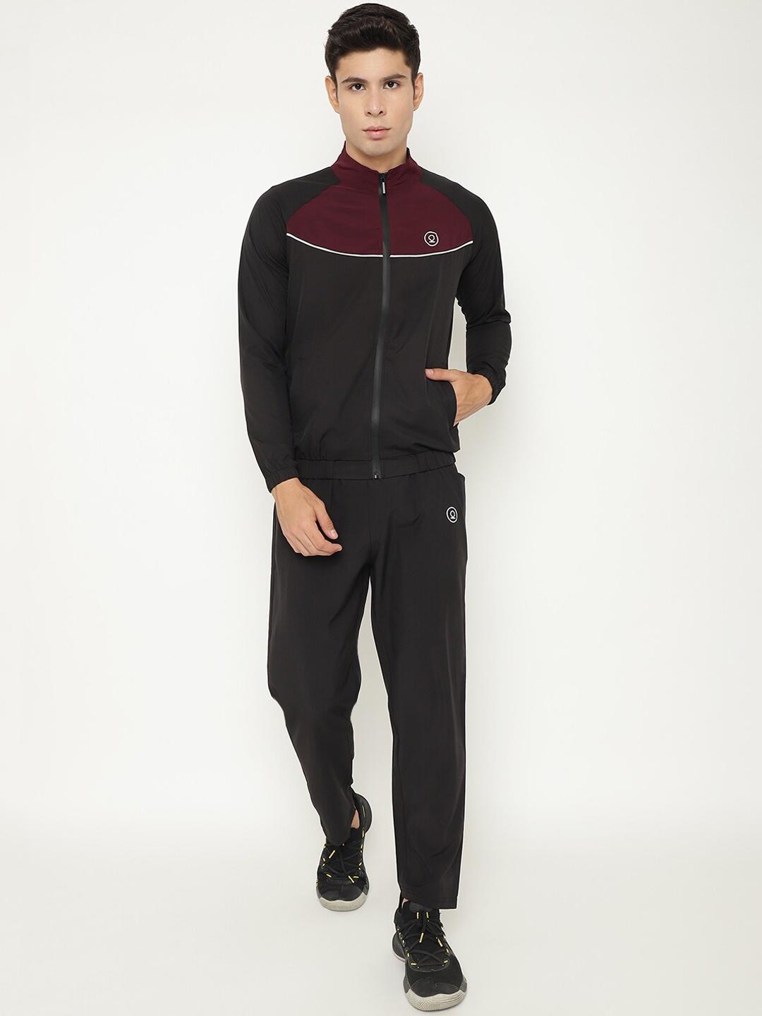

Chkokko Men Burgundy & Black Colourblocked Tracksuit