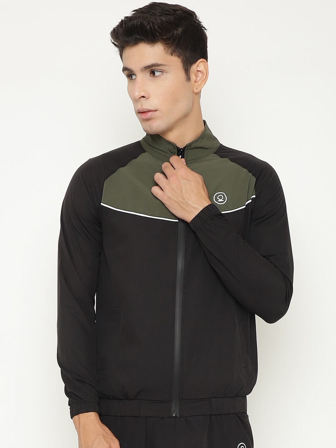 

Chkokko Olive Green & Black Colourblocked Windcheater and Water Resistant Sporty Jacket