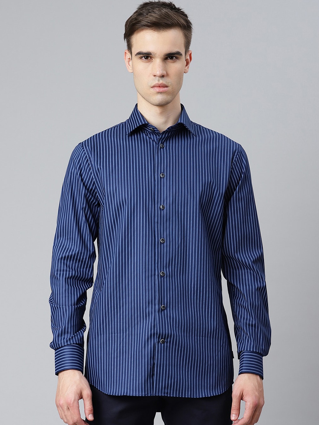 

Matinique Men Navy Blue Opaque Striped Semiformal Shirt