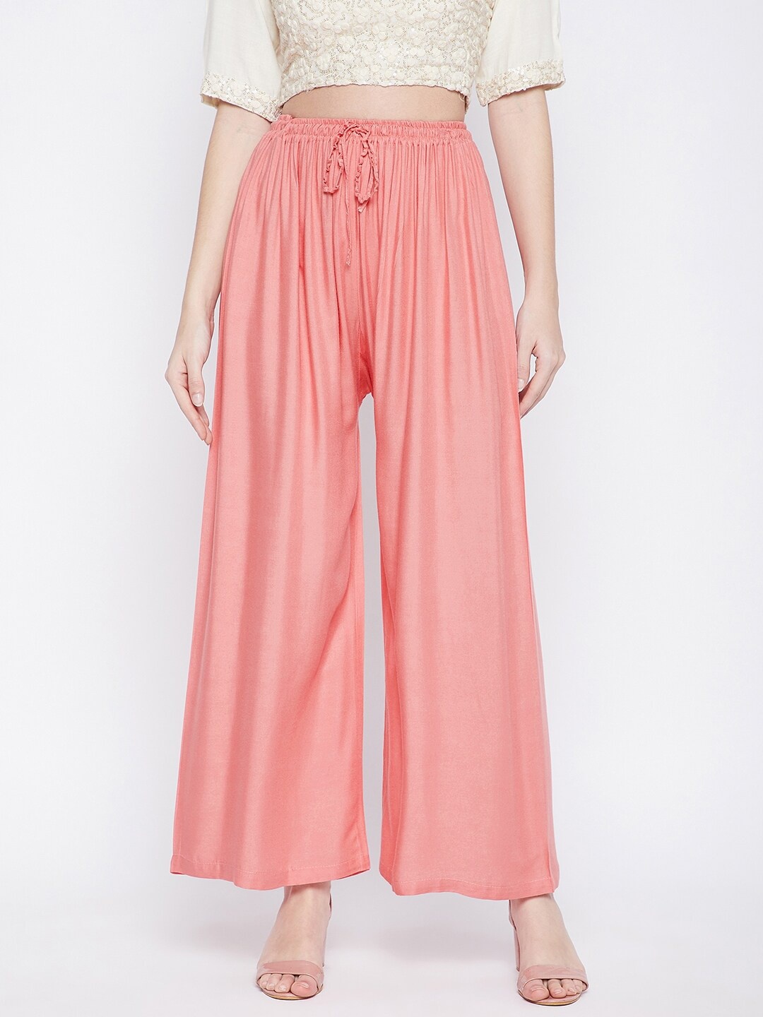 

Clora Creation Women Peach-Coloured Flared Knitted Palazzos