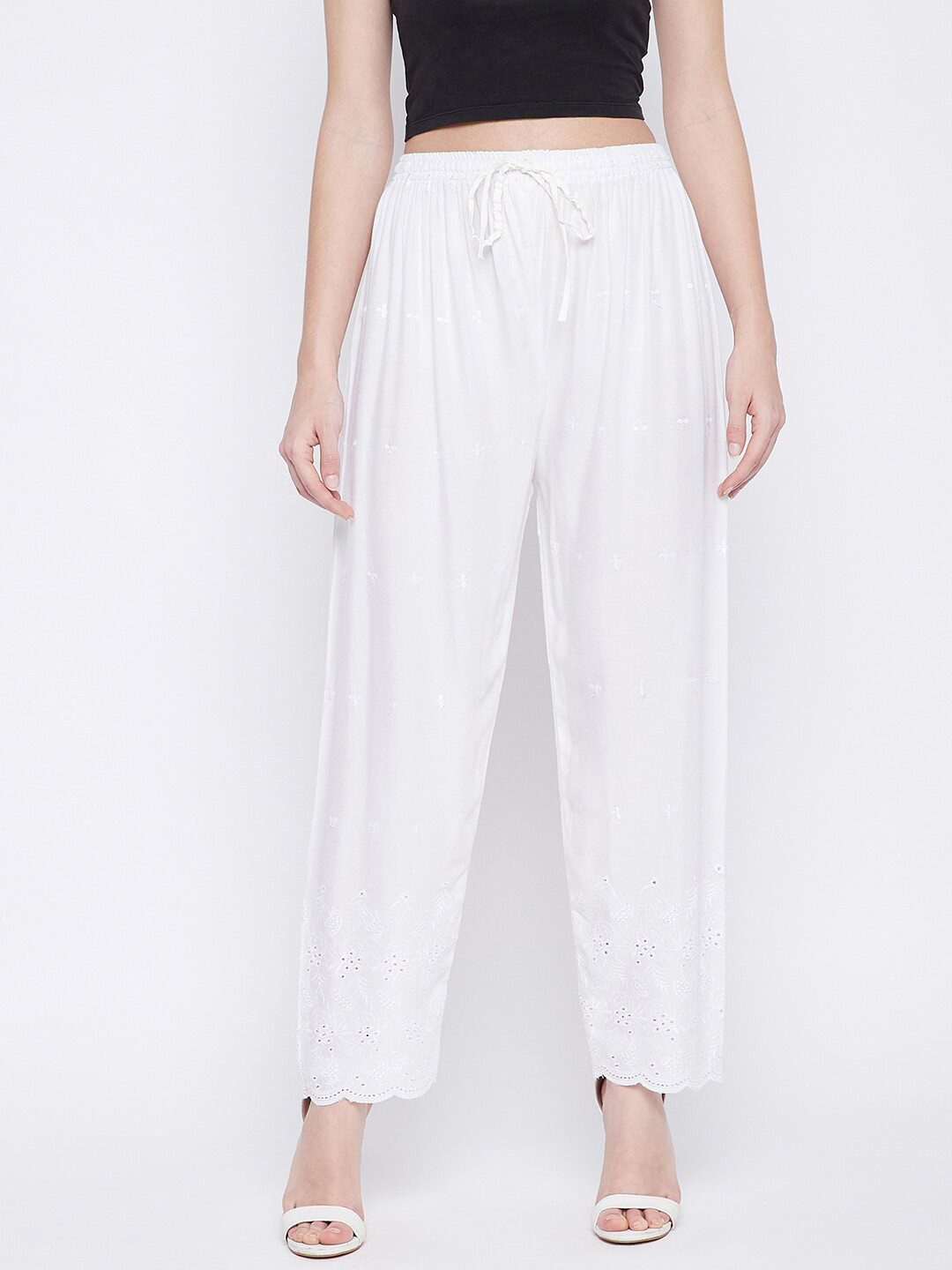 

Clora Creation Women White Floral Embroidered Chikankari Knitted Palazzos