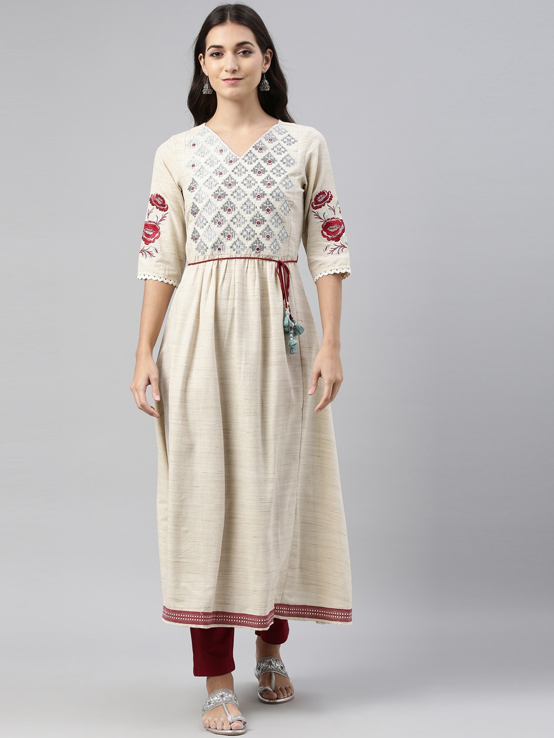 

Neerus Women Beige & Red Ethnic Motifs Embroidered Kurta