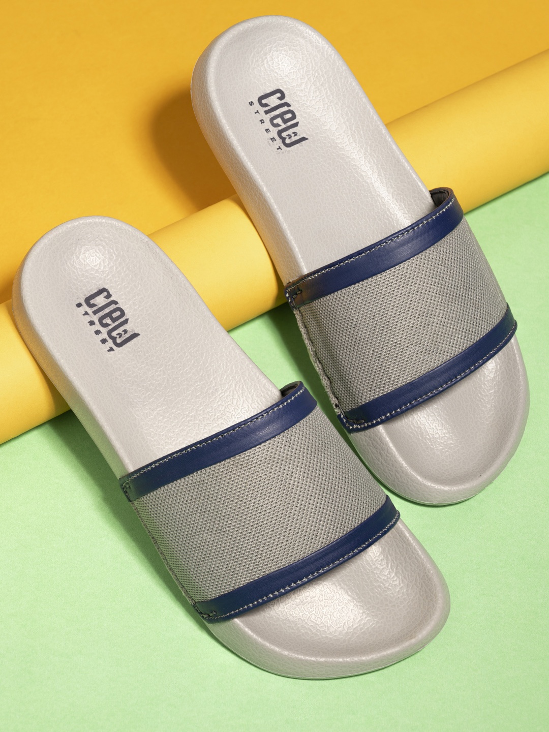 

Crew STREET Men Grey & Navy Blue Self Design Sliders