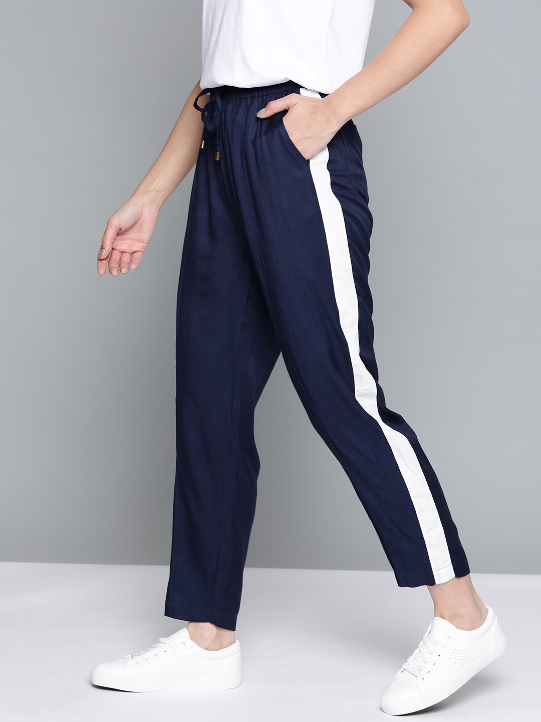 

Mast & Harbour Women Navy Blue Solid Pleated Trousers