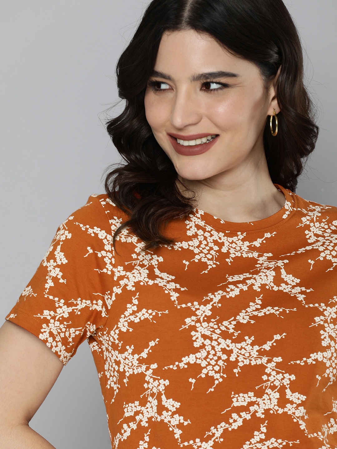 

Mast & Harbour Women Orange & White Floral Printed T-shirt