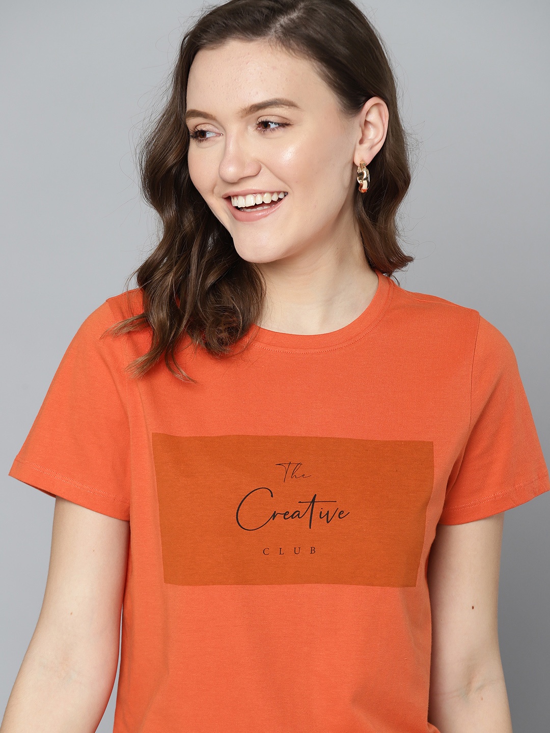 

Mast & Harbour Women Orange & Black Typography Print Pure Cotton T-shirt