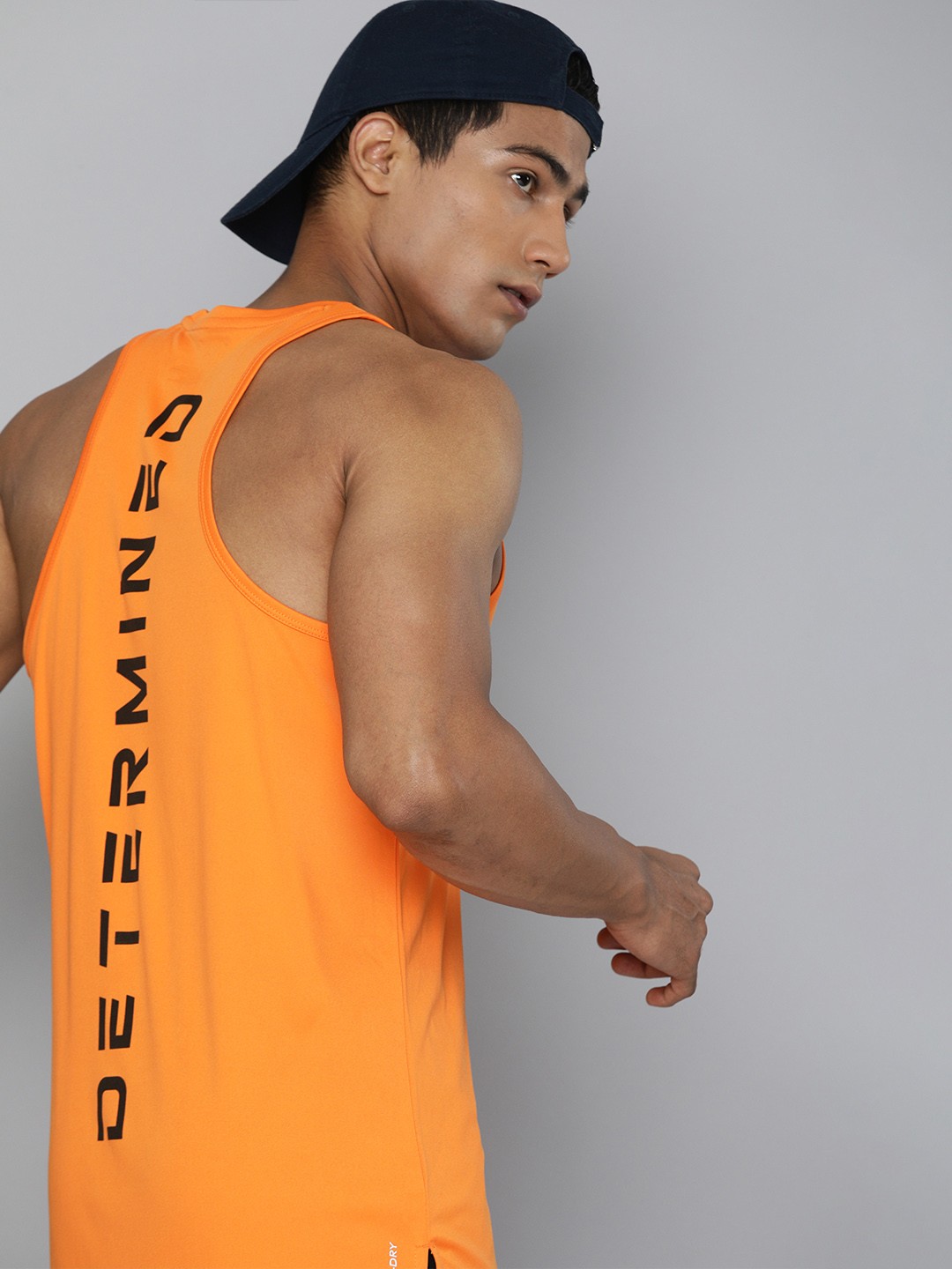 

HRX By Hrithik Roshan Training Men Orange & Black Typography Rapid-Dry Tshirts