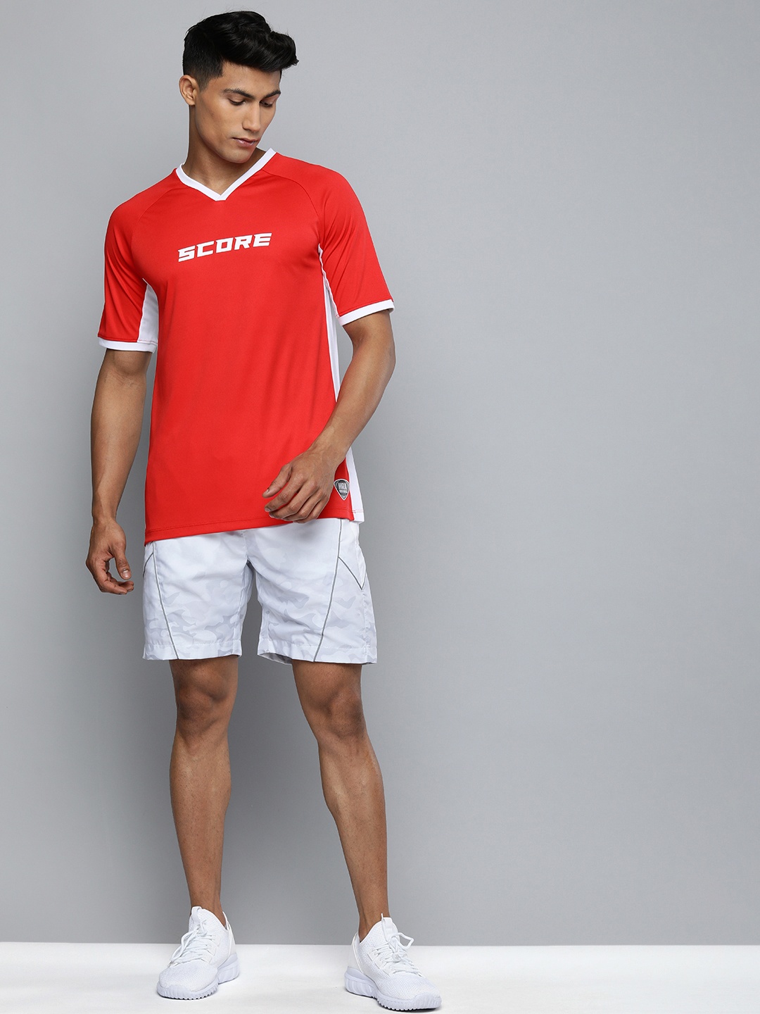 

HRX By Hrithik Roshan Football Men Light Rapid-Dry colourblock Tshirts, Orange
