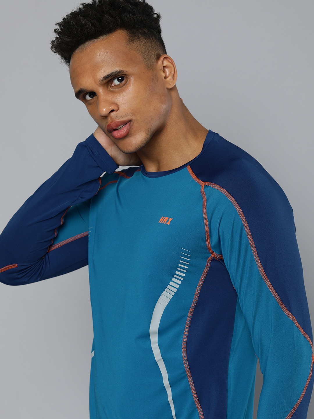 

HRX by Hrithik Roshan Men Blue Colourblocked Slim Fit Training or Gym T-shirt