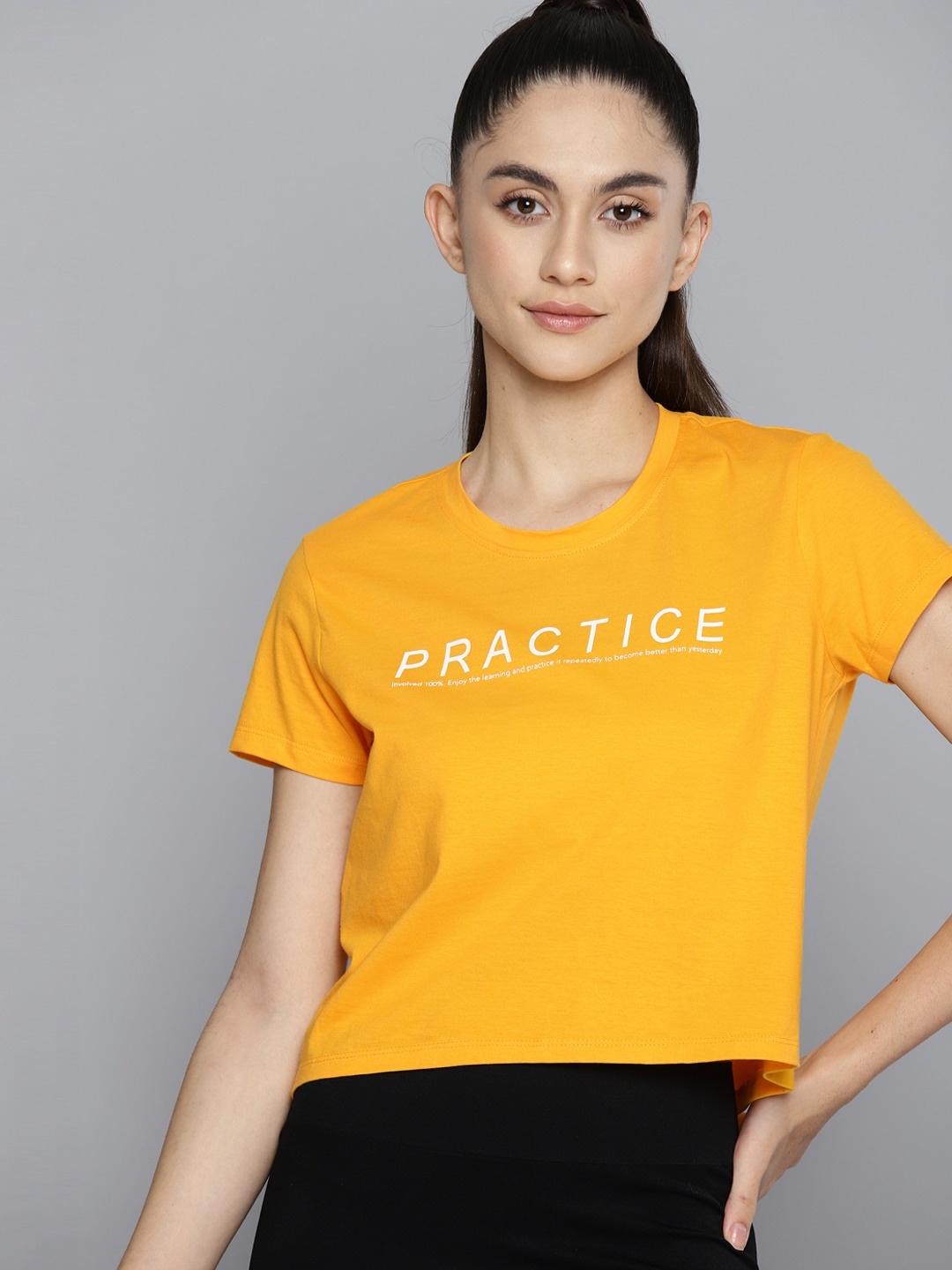 

HRX By Hrithik Roshan Yoga Women Saffron Printed Rapid-Dry Cut Out Cotton Sustainable Tshirt, Yellow