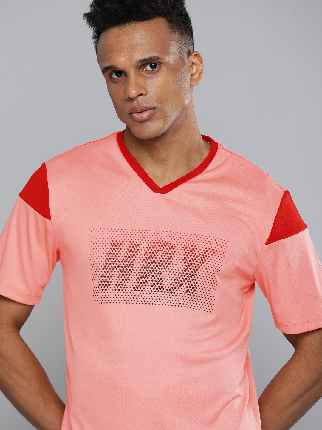 

HRX By Hrithik Roshan Men Rose Rapid-Dry Brand Carrier Football Tshirts