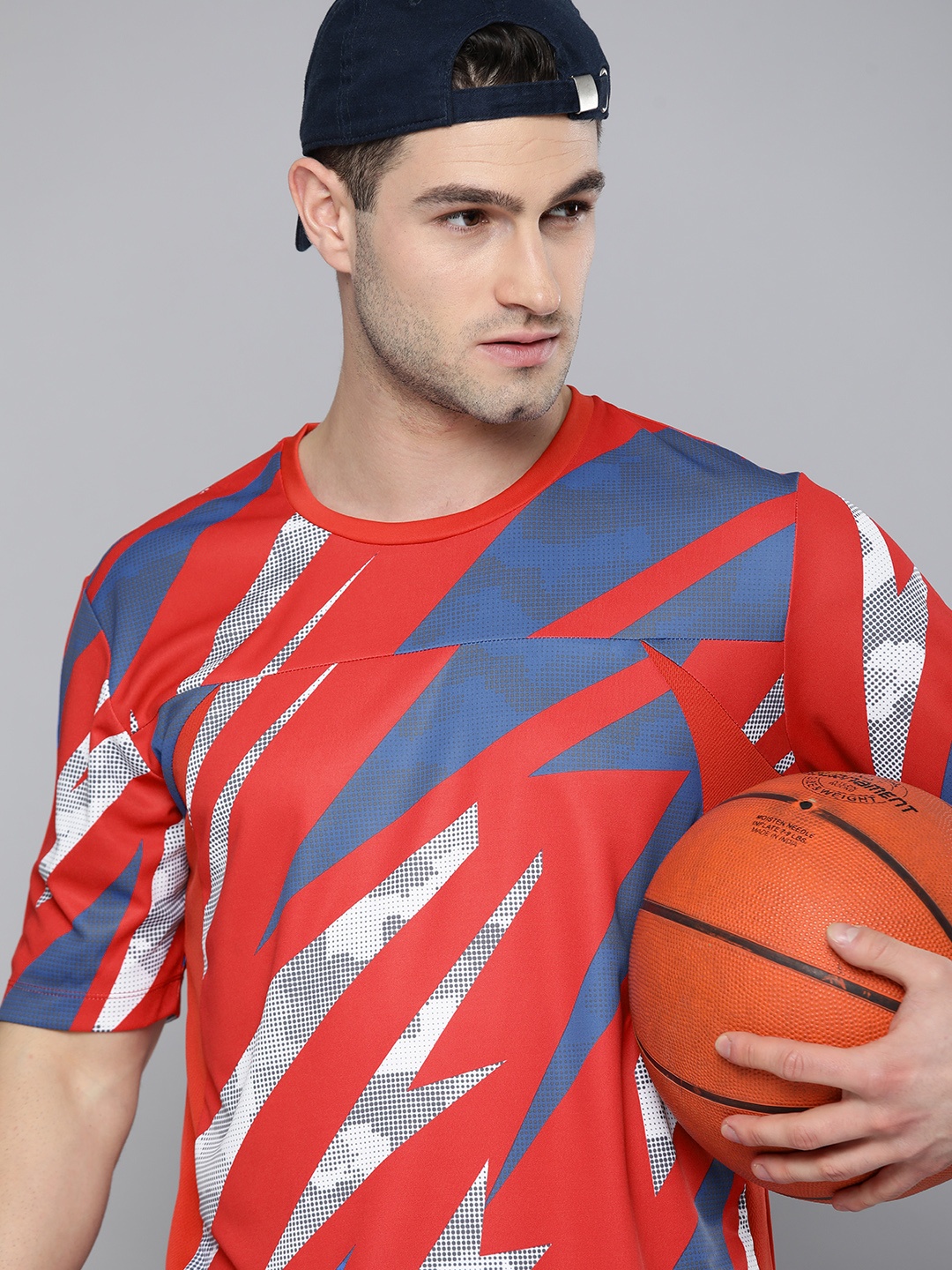 

HRX By Hrithik Roshan Men Red And Blue Geometric Printed Rapid-Dry Basketball Tshirt
