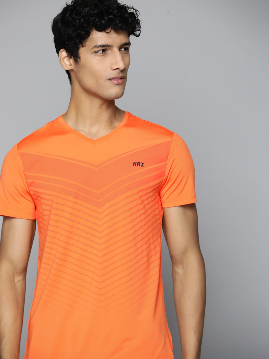 

HRX By Hrithik Roshan Training Men Seville Orange Rapid-Dry Tshirt