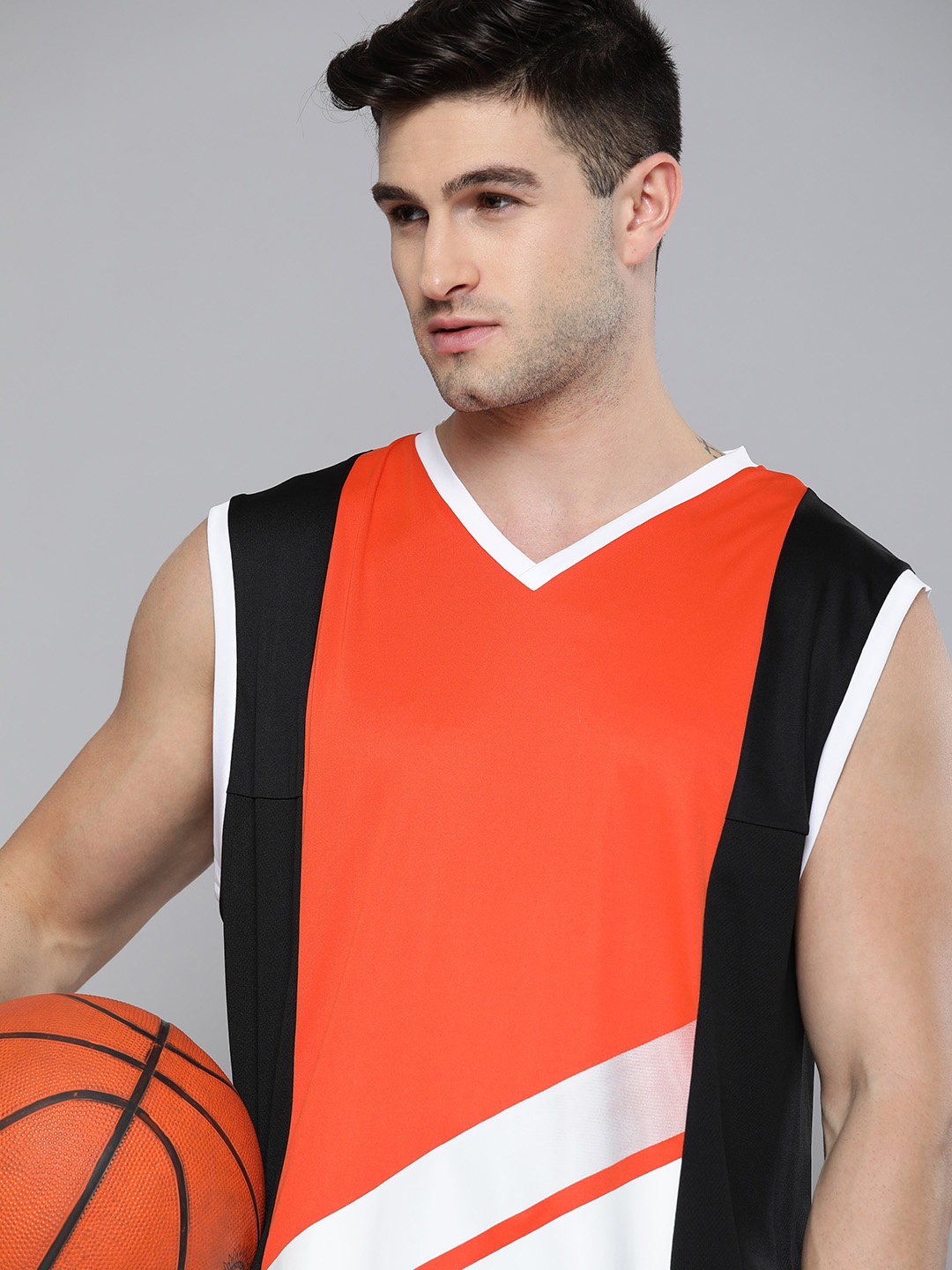 

HRX By Hrithik Roshan Basketball Men Orange & White Rapid-Dry colourblock Tshirts