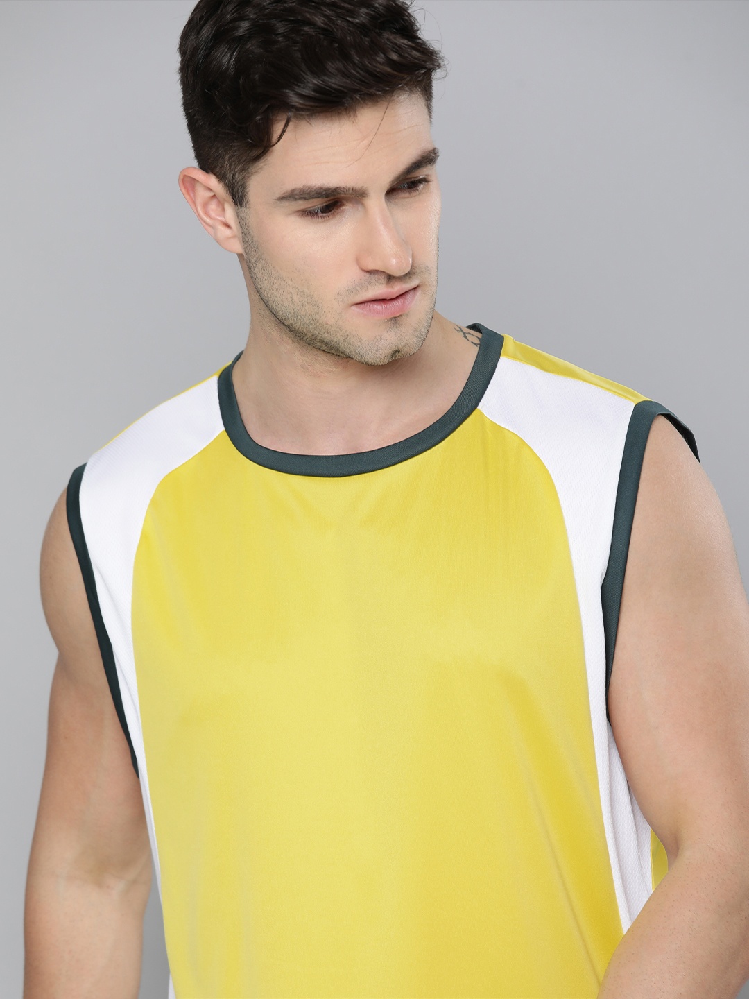 

HRX By Hrithik Roshan Basketball Men Aspen Gold Rapid-Dry Typography Tshirts, Yellow