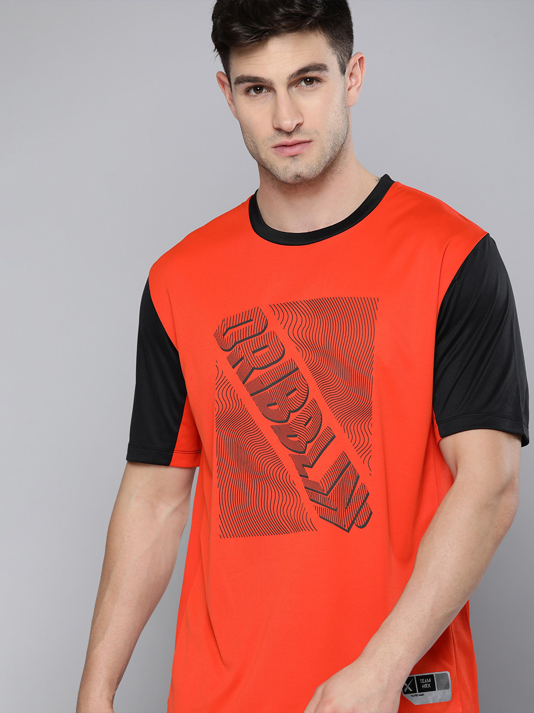 

HRX By Hrithik Roshan Men Jet Black & Orange Typography Rapid-Dry Basketball T-shirt