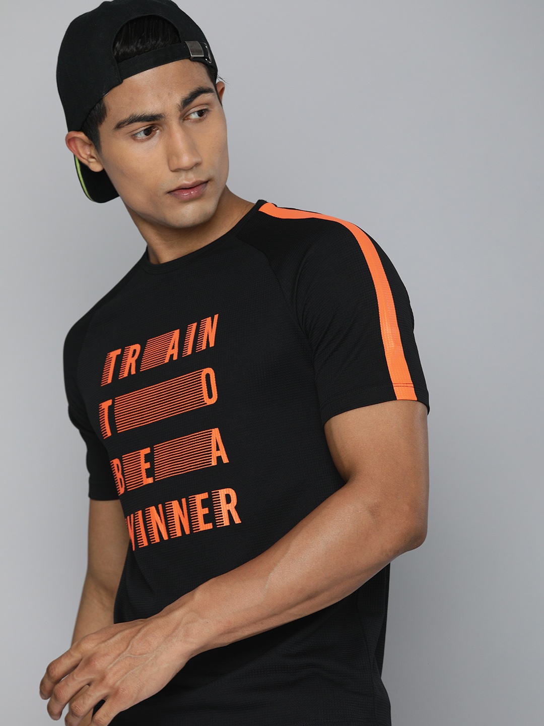 

HRX by Hrithik Roshan Men Black Rapid-Dry Brand Carrier Training or Gym T-shirt