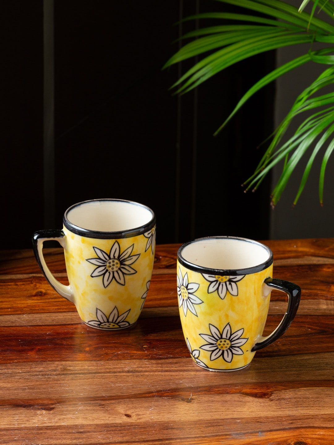 

ExclusiveLane Yellow & Black Hand Painted Printed Ceramic Glossy Coffee Mugs (300 ML)