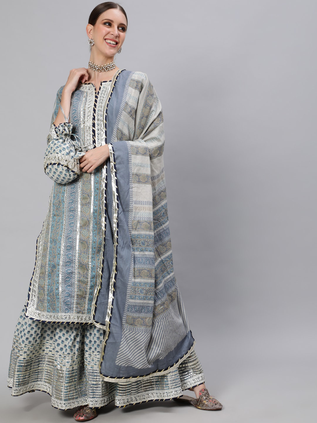 

Ishin Women Blue Ethnic Motifs High Slit Pure Cotton Kurta with Sharara & With Dupatta
