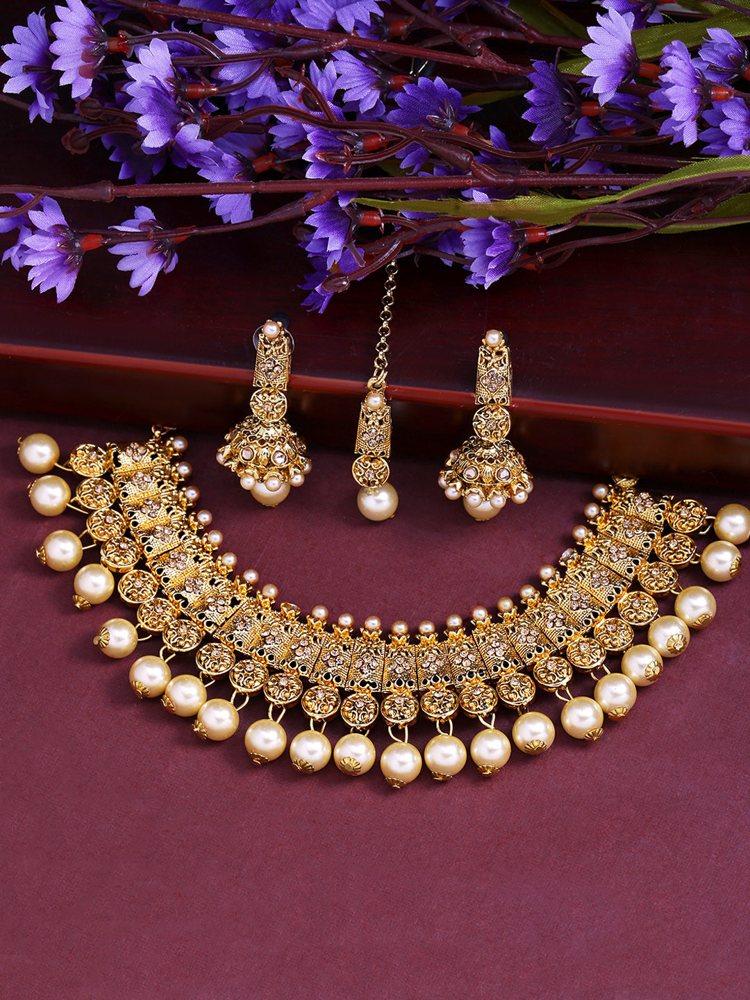 

Yellow Chimes Women Gold-Toned & Plated Kundan Antique Jewellery Set With Maang Tikka