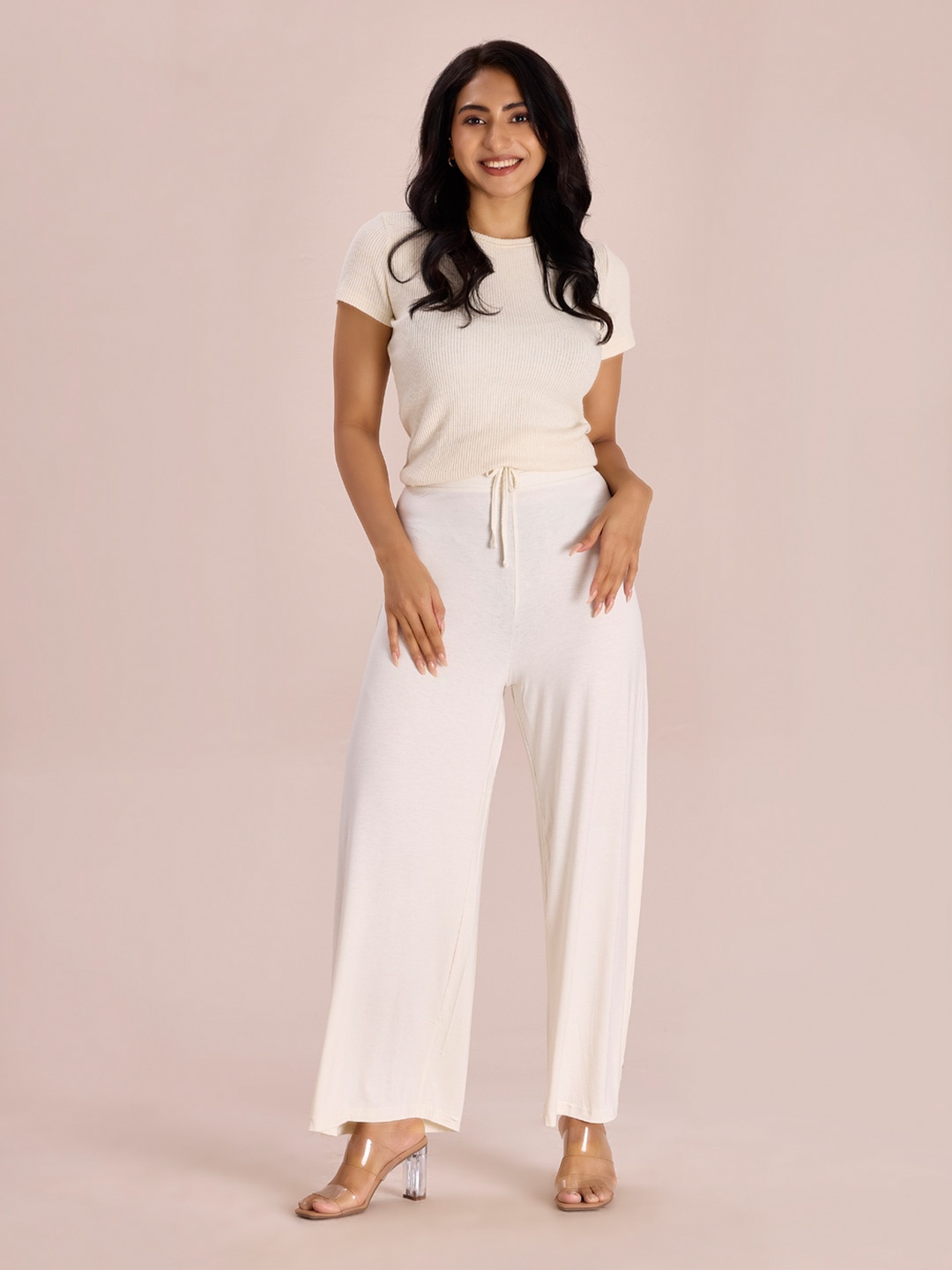 

Go Colors Women Beige Solid Mid Rise Palazzos